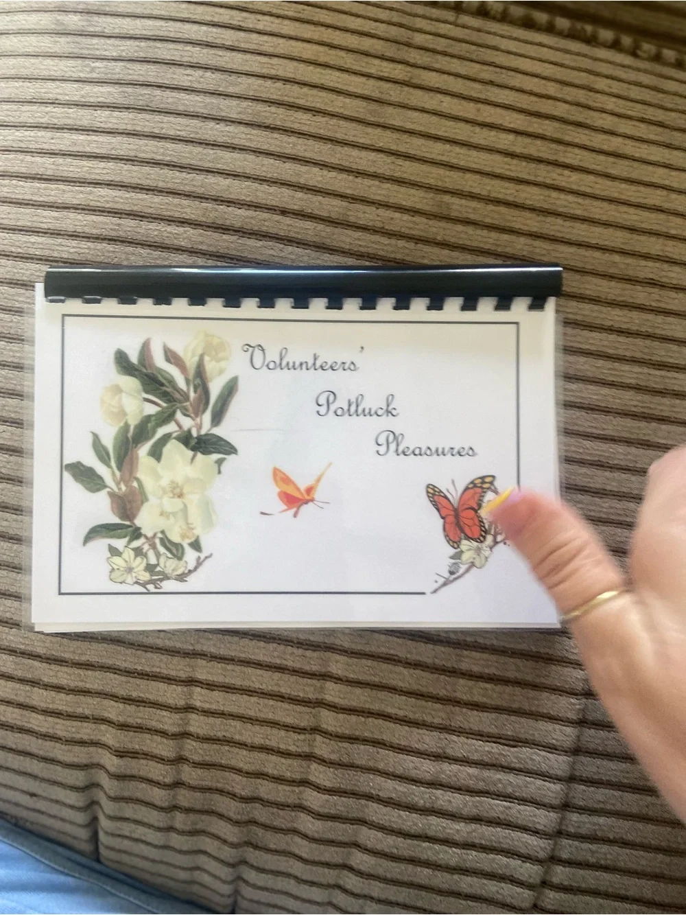 Volunteers' Potluck Pleasures Cookbook - White with Floral & Butterfly Design